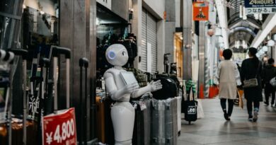 robot standing near luggage bags