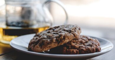 two cookies on white ceramic plate