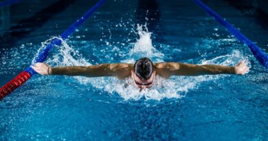 man doing butterfly stroke